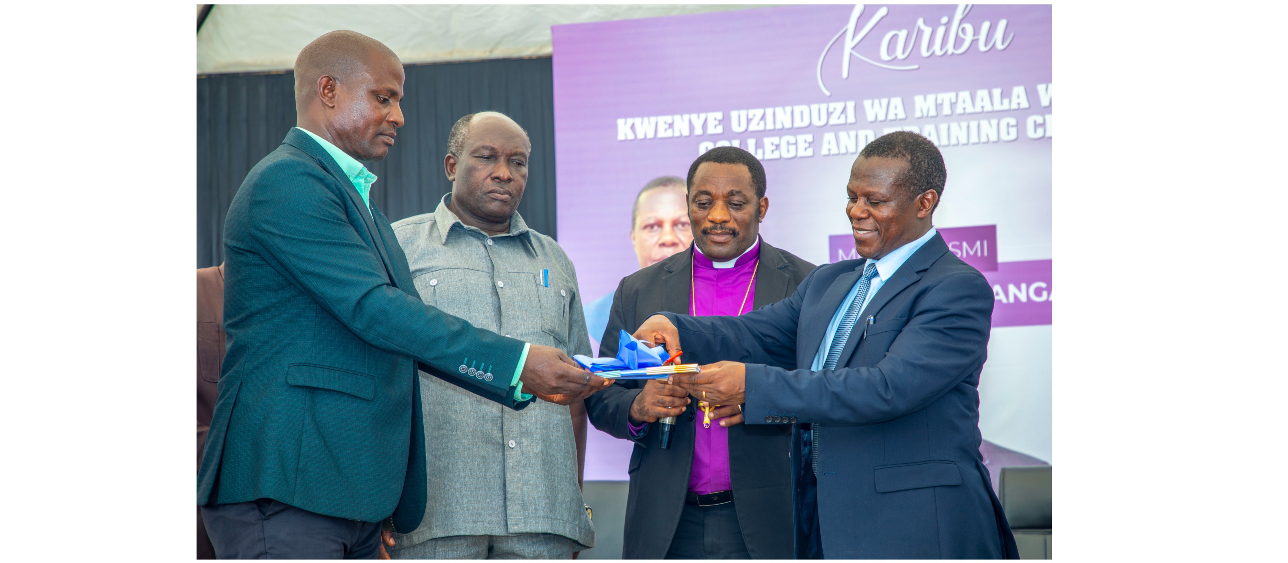 Mkuu wa Taasisi ya Elimu ya Watu Wazima (TEWW), Prof. Philipo Sanga, akizindua rasmi mtaala mpya ulioboreshwa wa ABC Bible College & Training Center k...